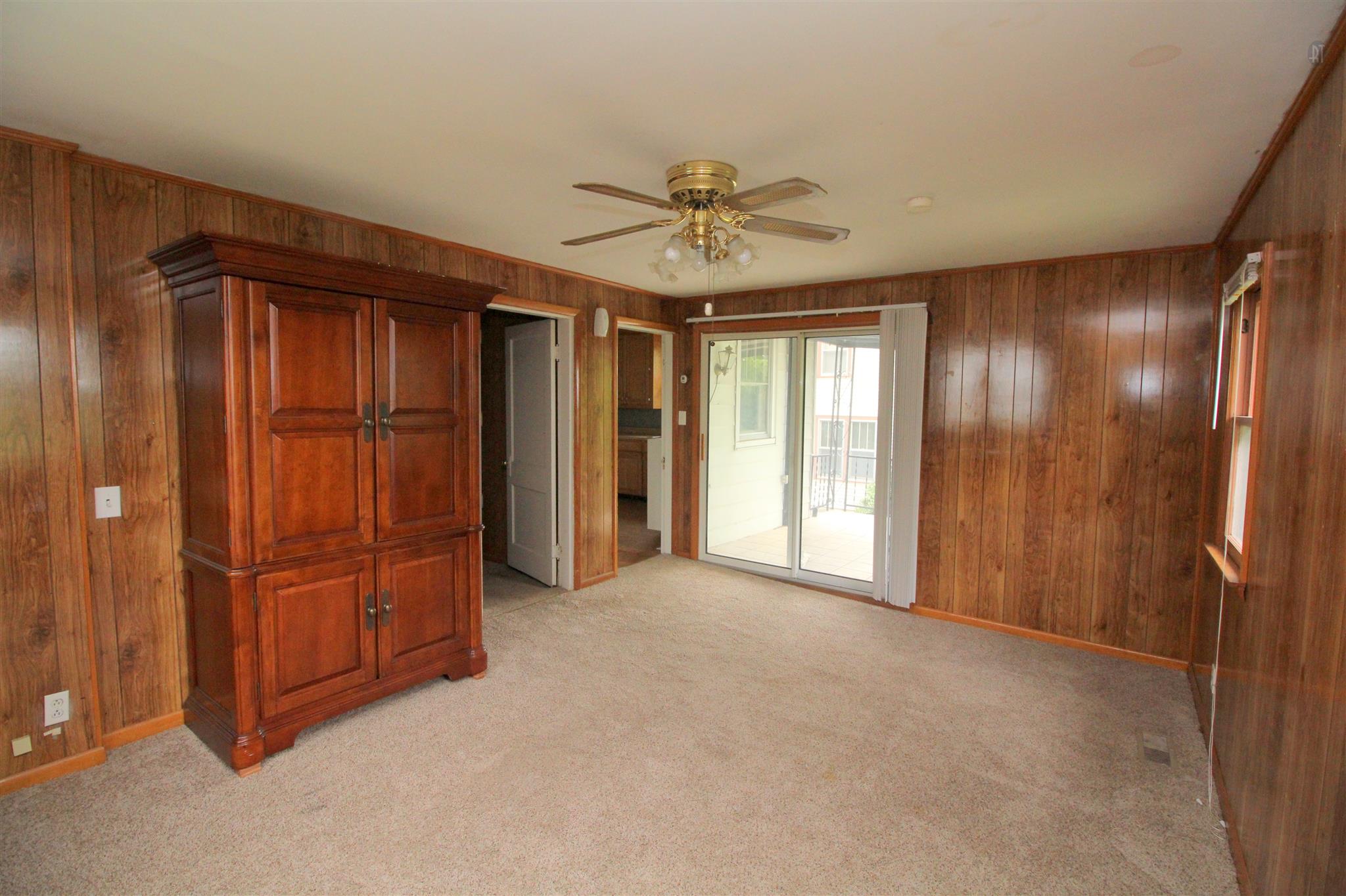 511 3rd Avenue West Springfield, TN 37172 - Photo 8 of 14 Large den and with double doors to the backyard covered deck.