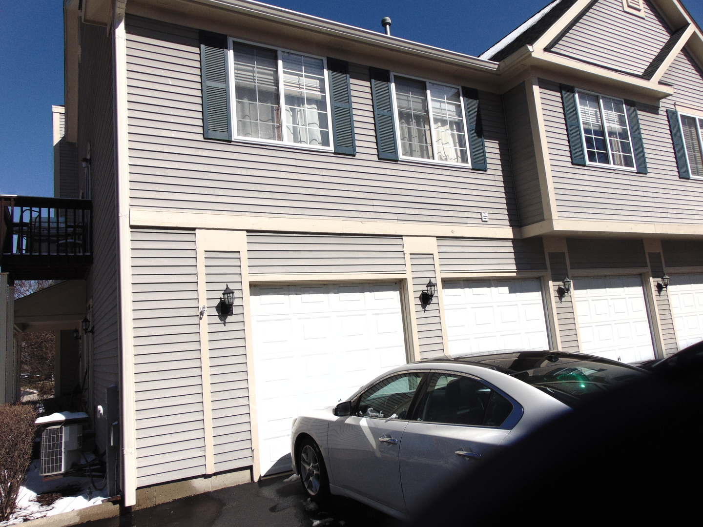 272 Windsor Court, Unit C South Elgin, IL 60177 - Photo 1 of 19 a house view with a backyard space