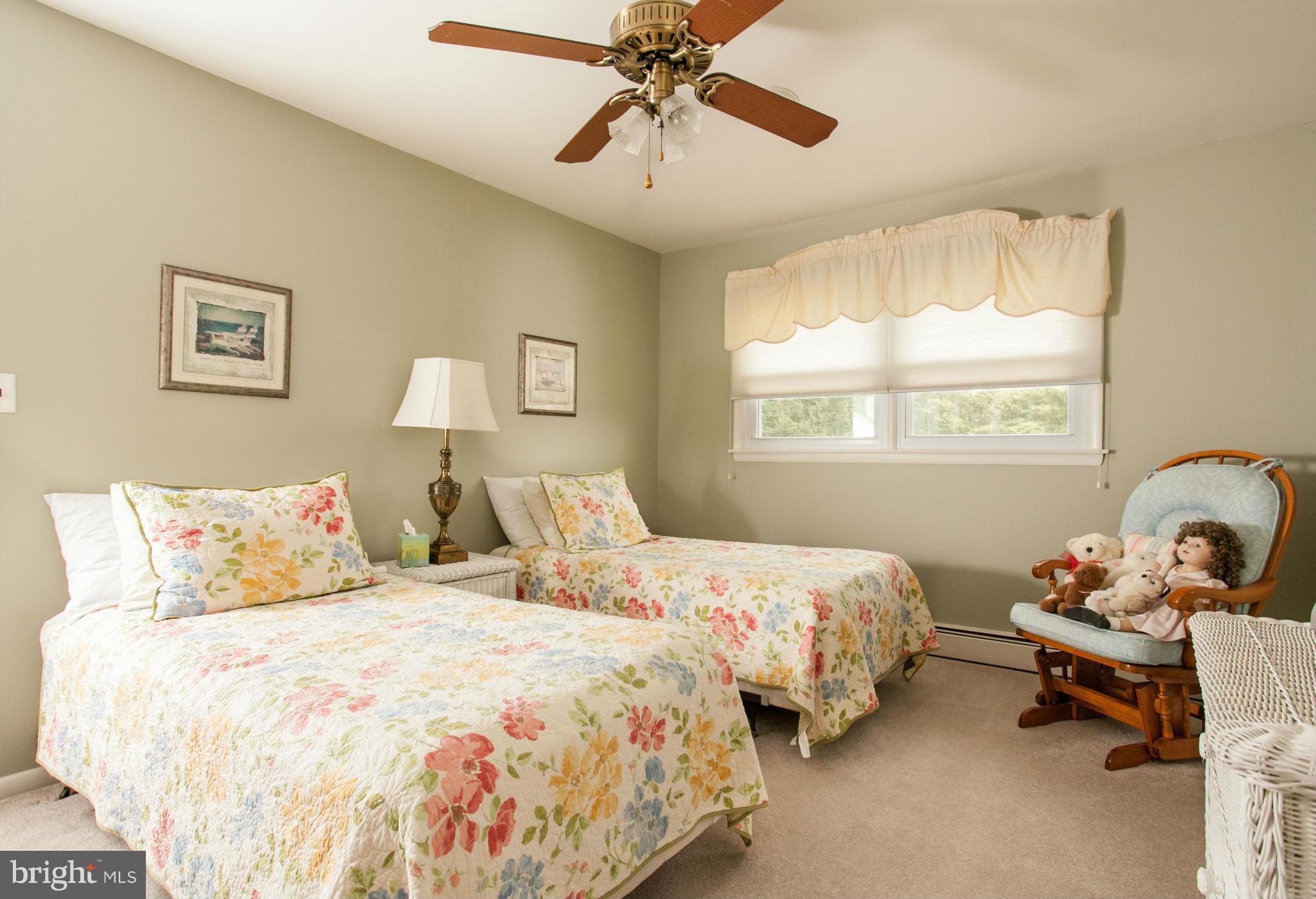 9914 Marilynn Road Perry Hall, MD 21128 - Photo 16 of 25 a bedroom with two beds and window