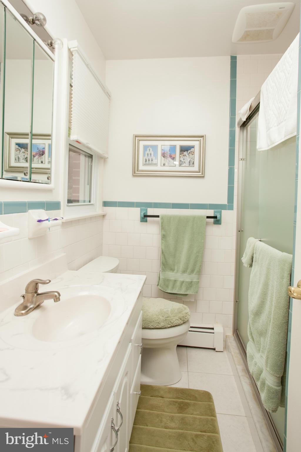 9914 Marilynn Road Perry Hall, MD 21128 - Photo 18 of 25 a bathroom with a sink and a mirror