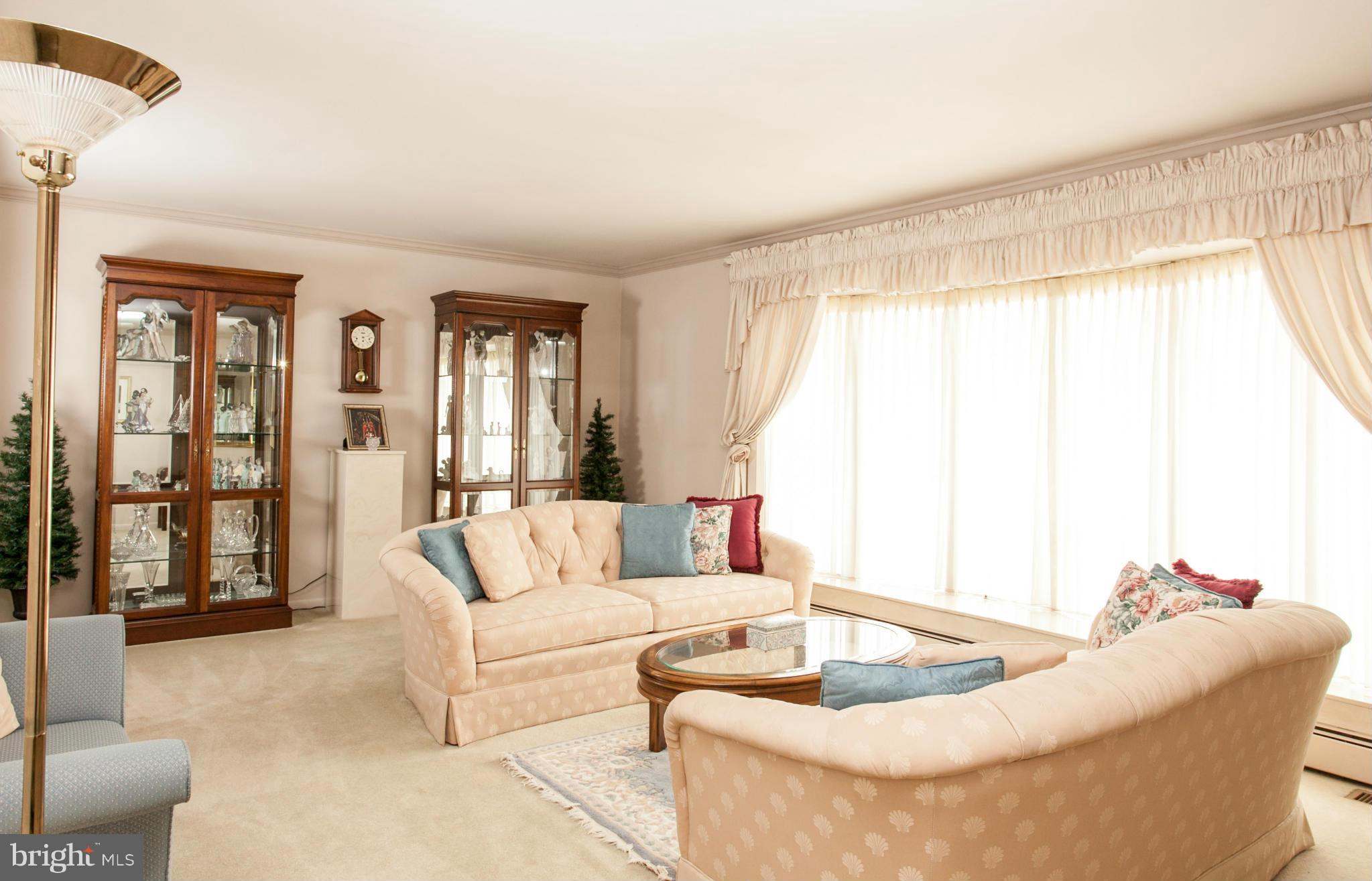 9914 Marilynn Road Perry Hall, MD 21128 - Photo 3 of 25 a living room with furniture and a large window