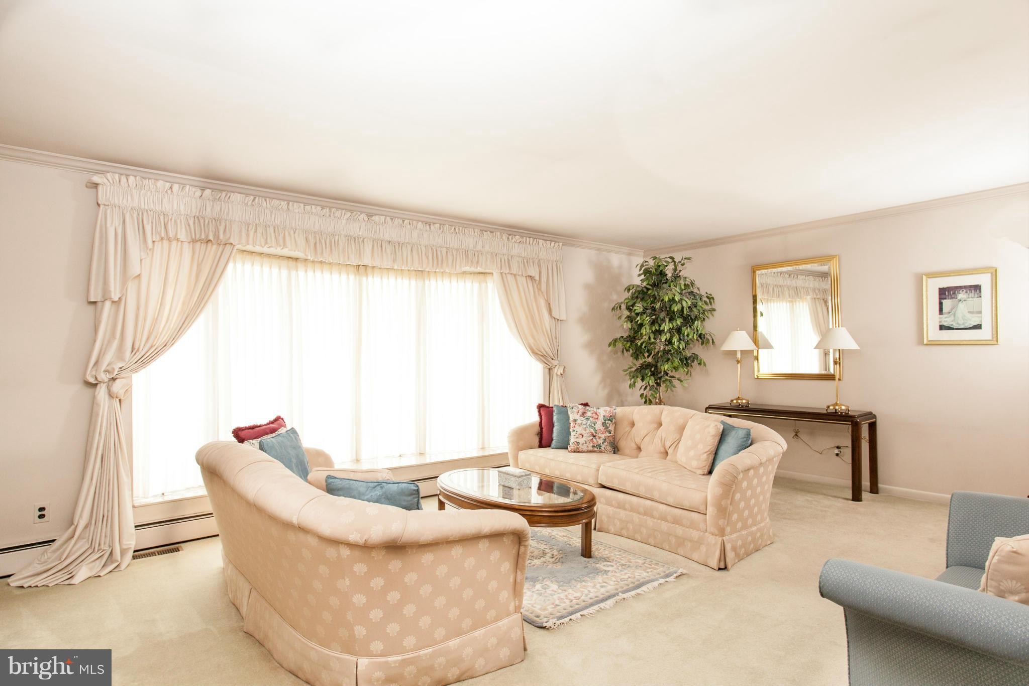 9914 Marilynn Road Perry Hall, MD 21128 - Photo 4 of 25 a living room with furniture and a large window