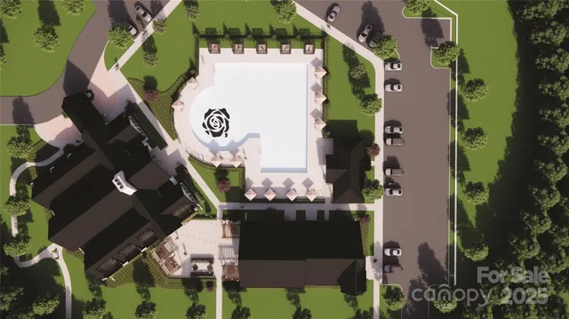 an aerial view of waterside residential houses with street