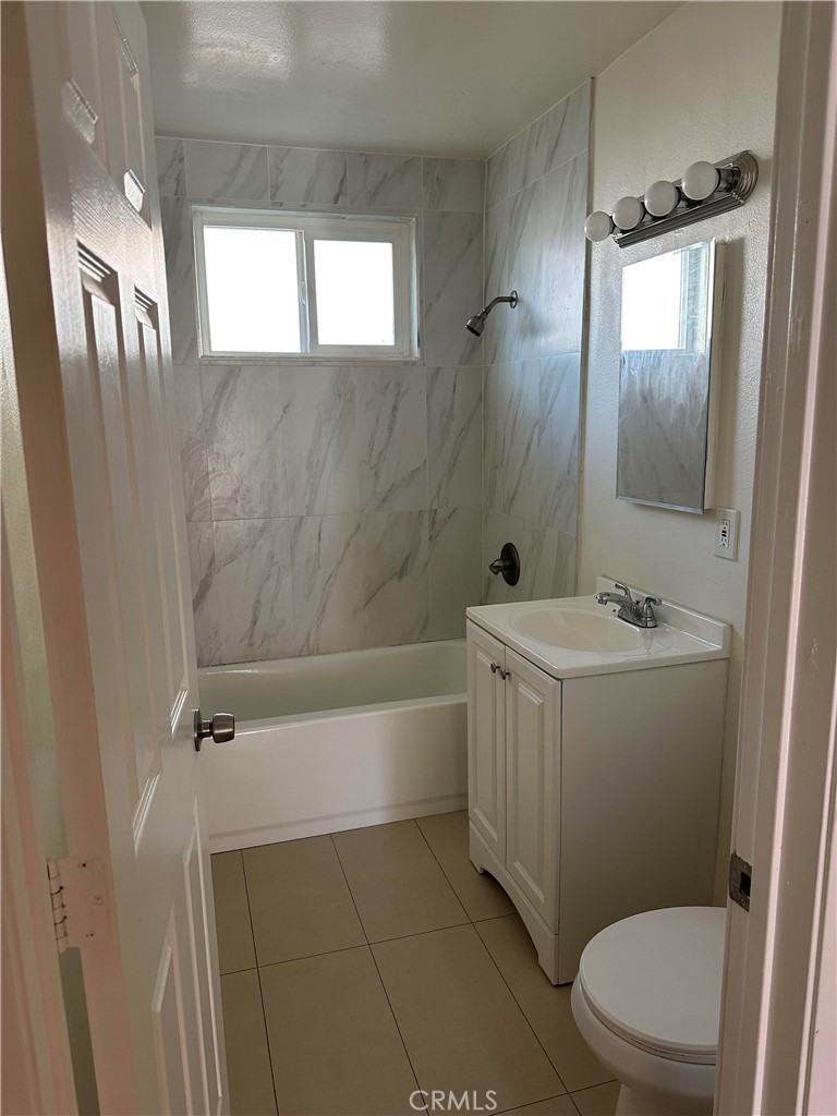 366 South Vecino Drive, Unit 1 Covina, CA 91723 - Photo 8 of 8 a bathroom with a sink a toilet and shower