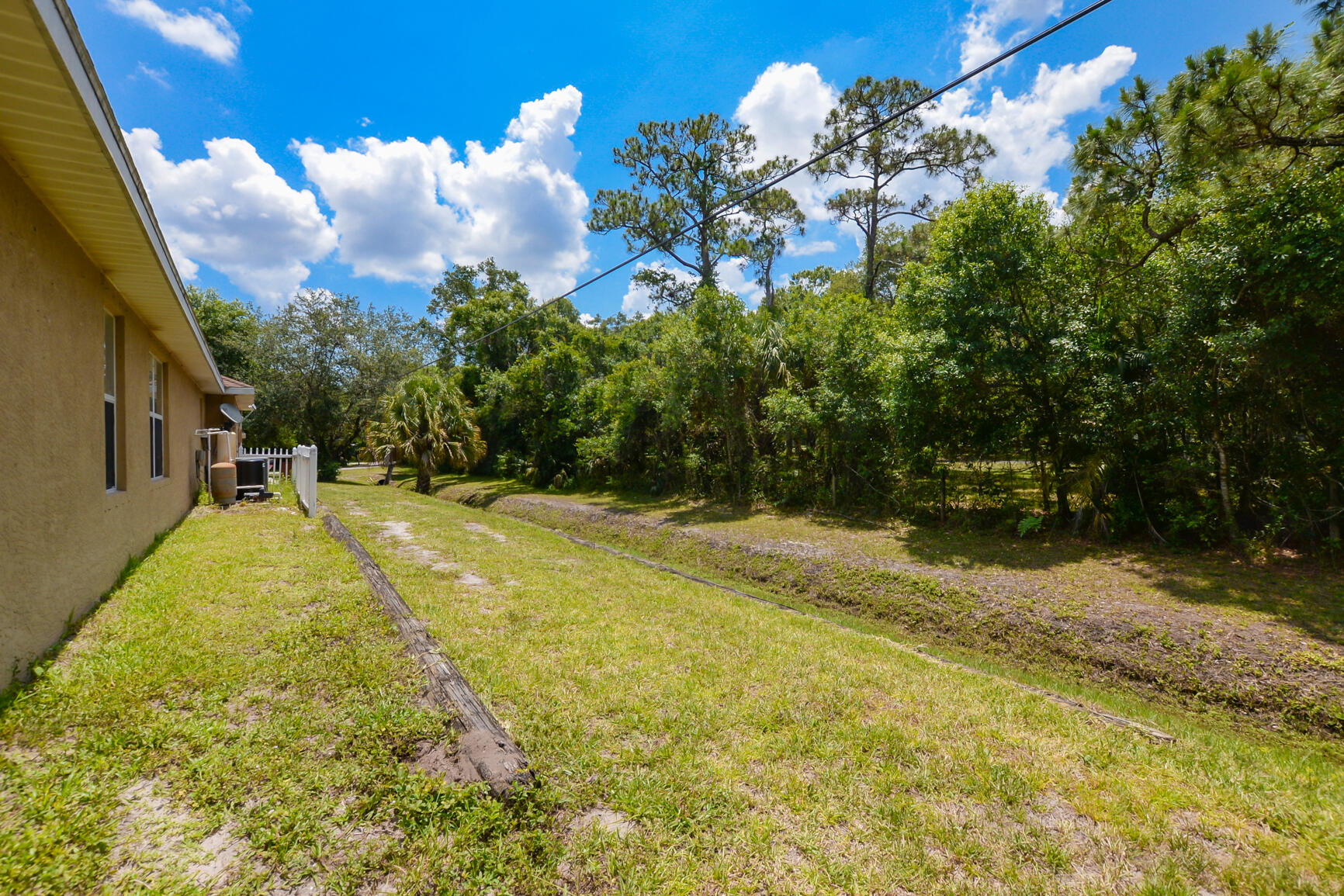 2681 Coolidge Road Fort Pierce, FL 34945 - Photo 37 of 47 right side house