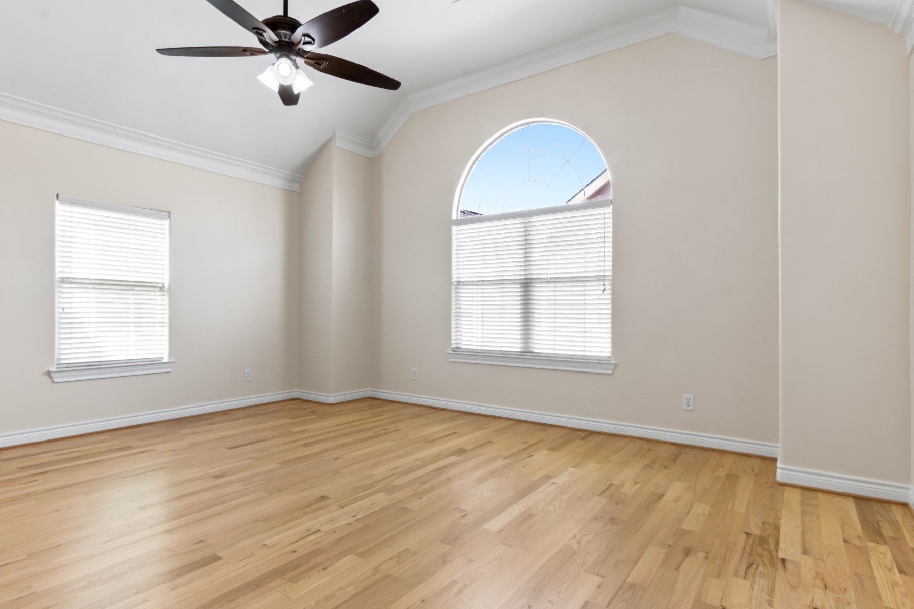 2917 Clinton Drive Houston, TX 77020 - Photo 15 of 24 a view of an empty room with wooden floor and a window