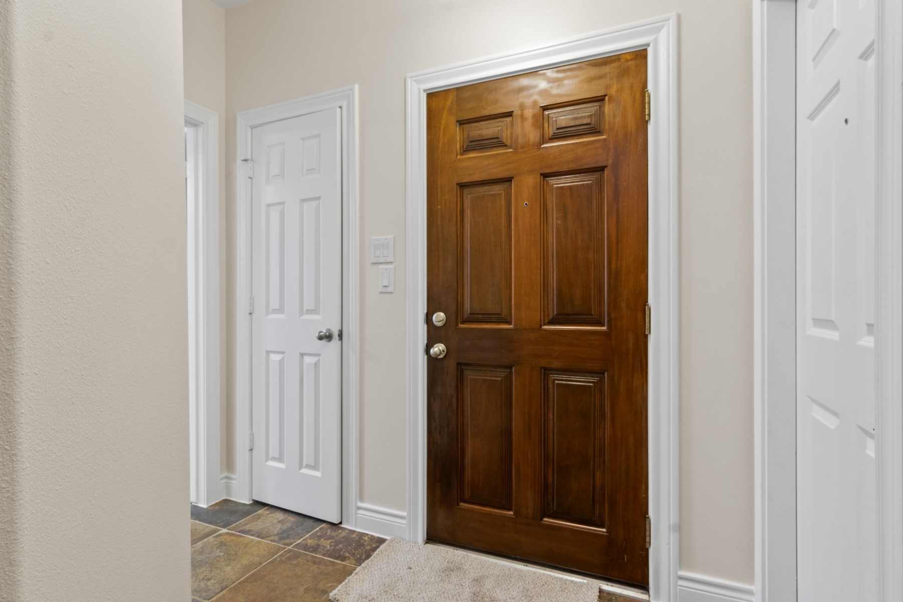 2917 Clinton Drive Houston, TX 77020 - Photo 6 of 24 an entryway door with wooden floor