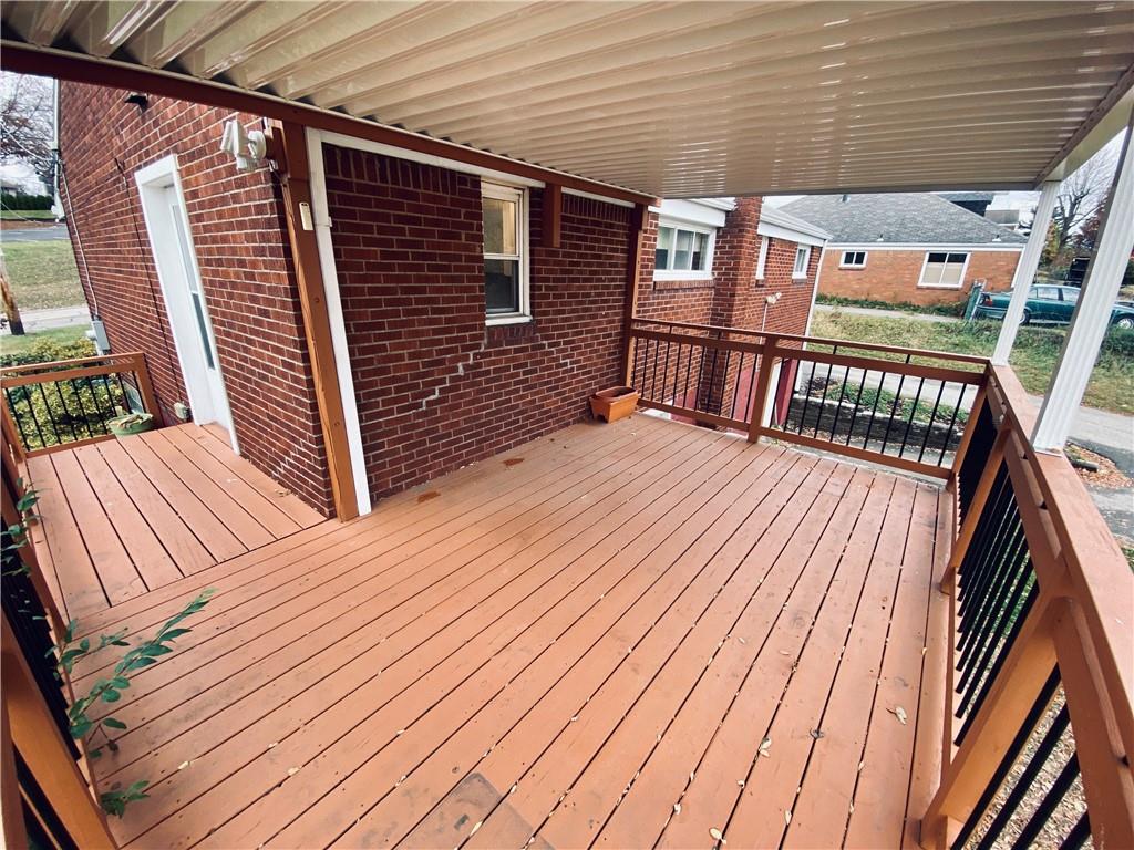 206 Streets Run Road Pittsburgh, PA 15236 - Photo 19 of 22 The deck is accessed from the kitchen.