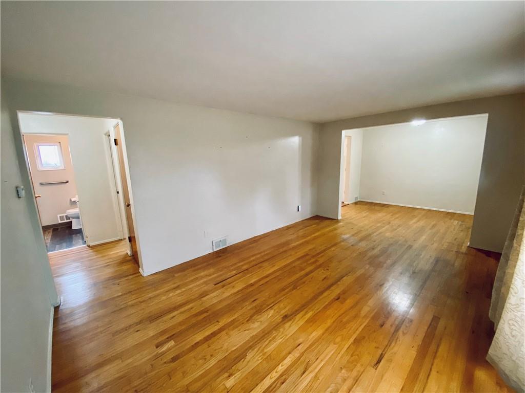 206 Streets Run Road Pittsburgh, PA 15236 - Photo 3 of 22 Open living and dining rooms.