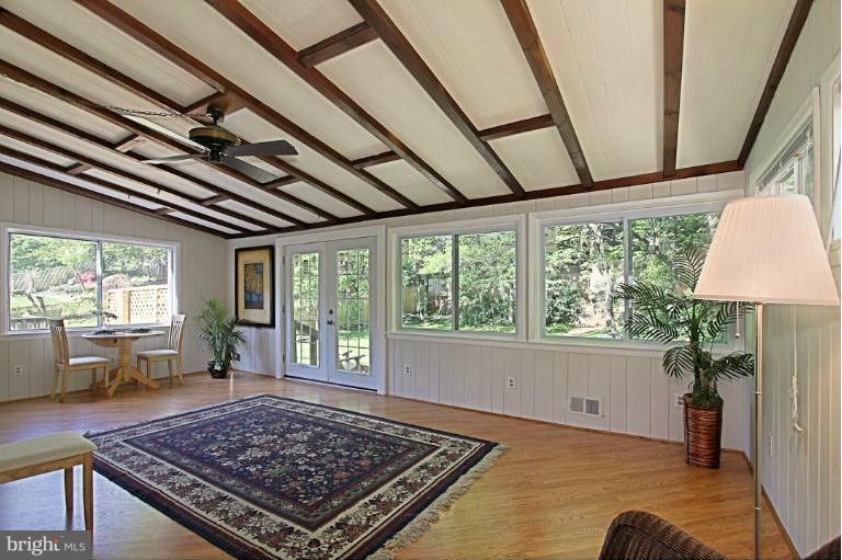 10306 Colesville Road Silver Spring, MD 20901 - Photo 4 of 30 a living room with furniture and a rug