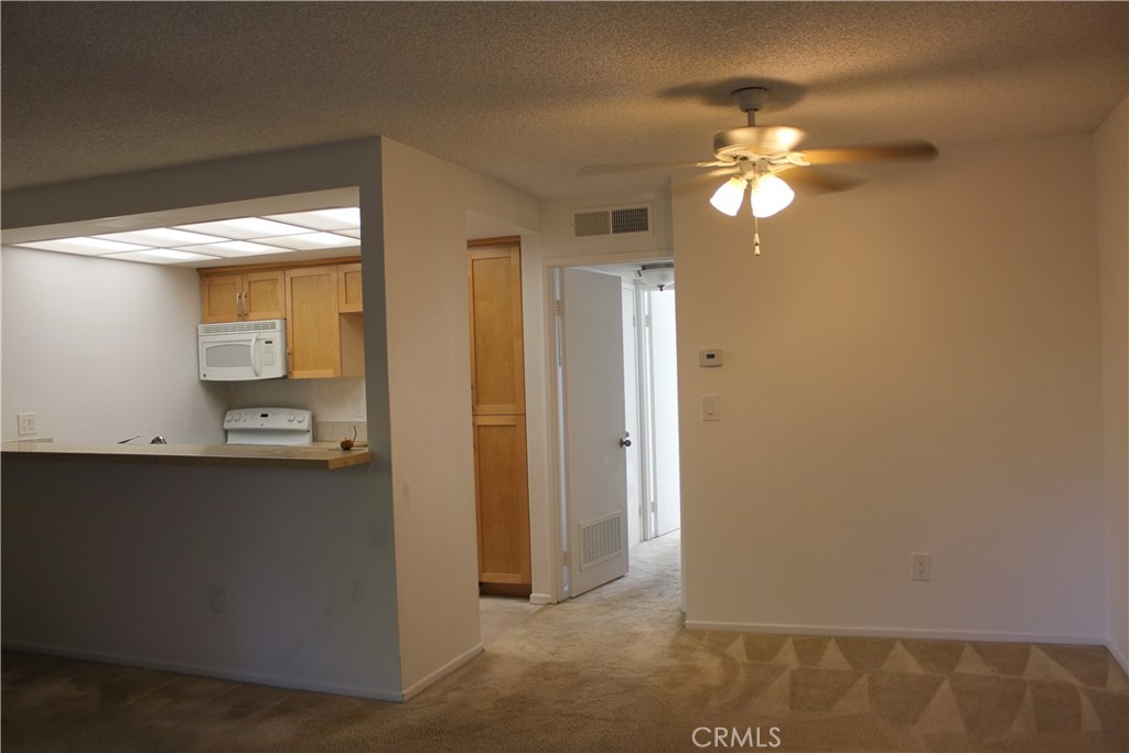a view of a bathroom with a sink and mirror