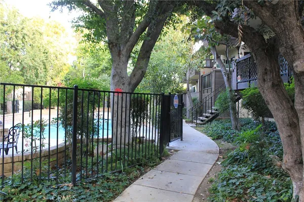a view of a house with a street