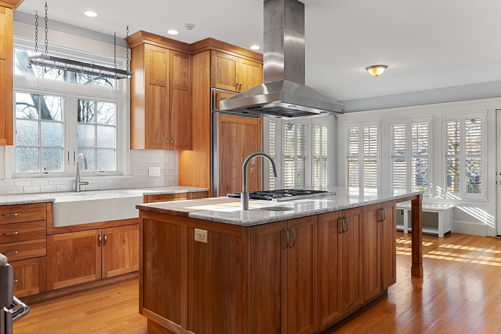 20 Winthrop Road Lexington, MA 02421 - Photo 3 of 33 a kitchen with stainless steel appliances granite countertop a sink and a stove