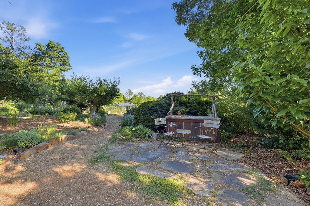 1823 Shoal Creek Road Clarkesville, GA 30523 - Photo 131 of 149 a view of a house with a yard and sitting area