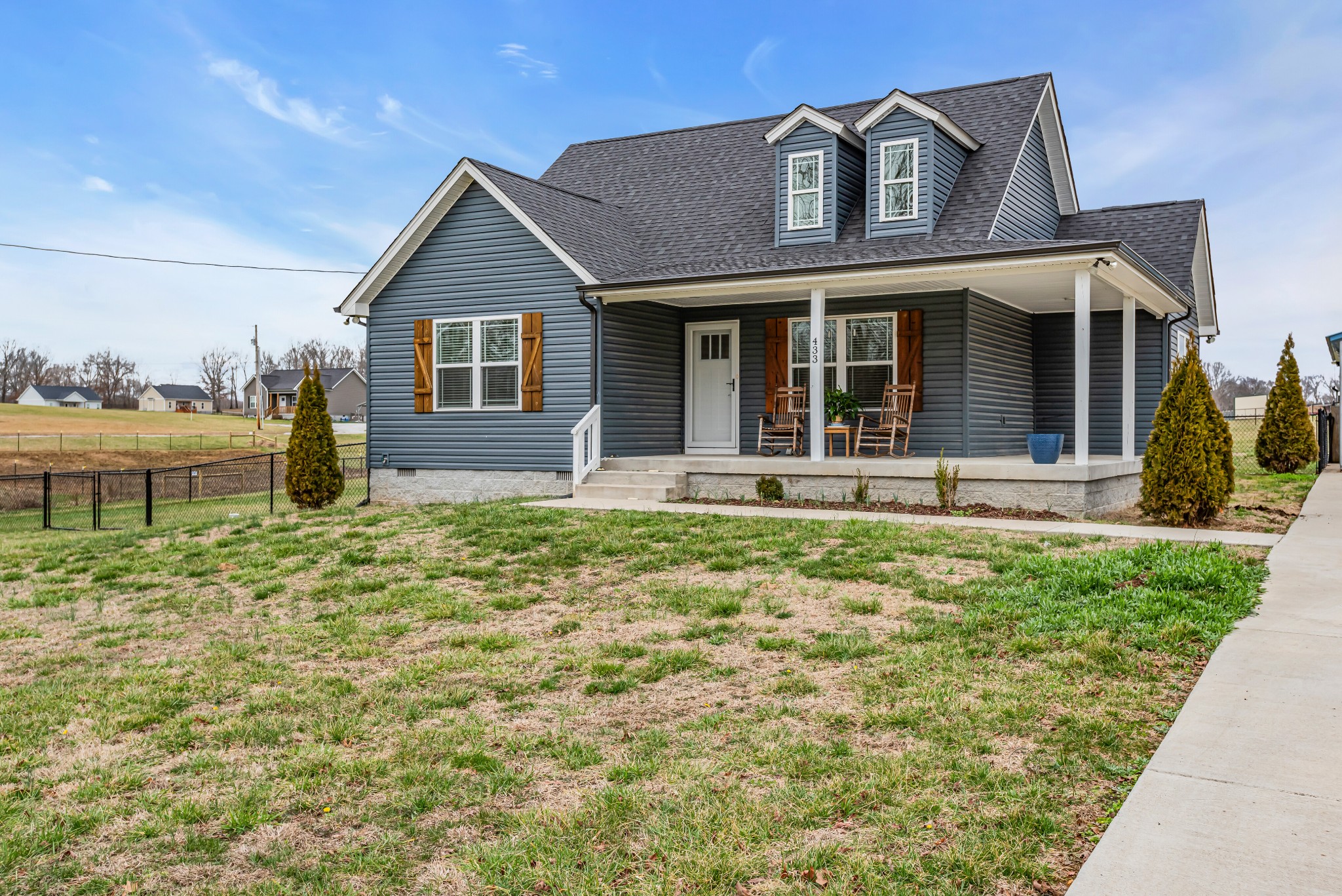 433 Pruett Road Dickson, TN 37055 - Photo 2 of 24 a front view of a house with garden
