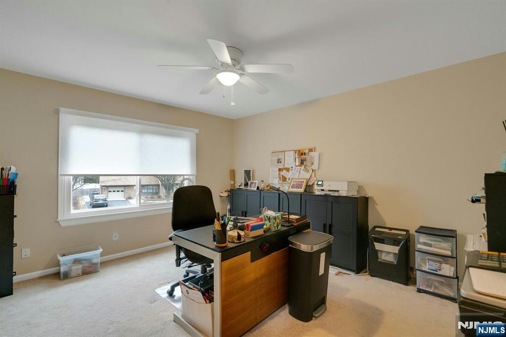111 Crain Road Paramus, NJ 07652 - Photo 20 of 30 a view of a workspace with furniture and a window