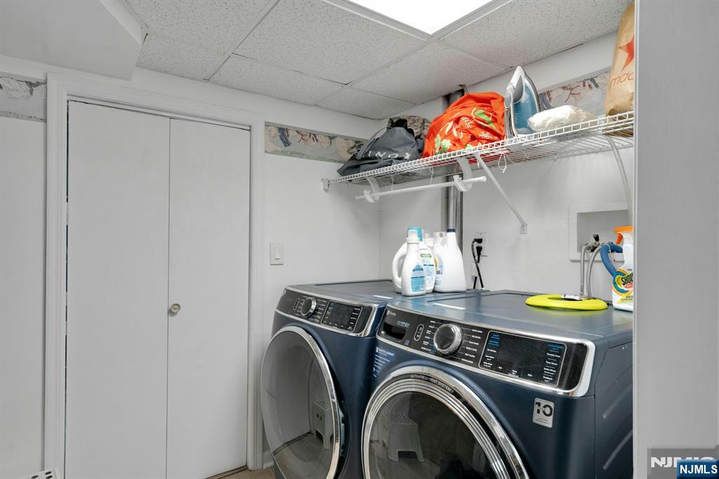 111 Crain Road Paramus, NJ 07652 - Photo 26 of 30 a utility room with dryer and washer