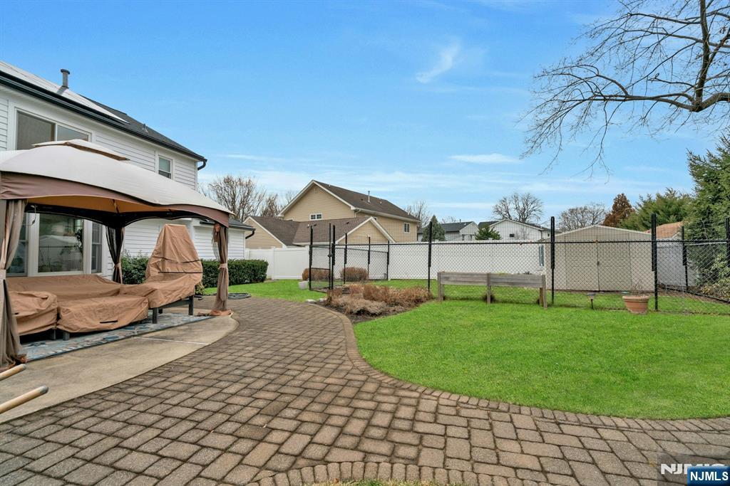 111 Crain Road Paramus, NJ 07652 - Photo 28 of 30 a view of a house with backyard and sitting area