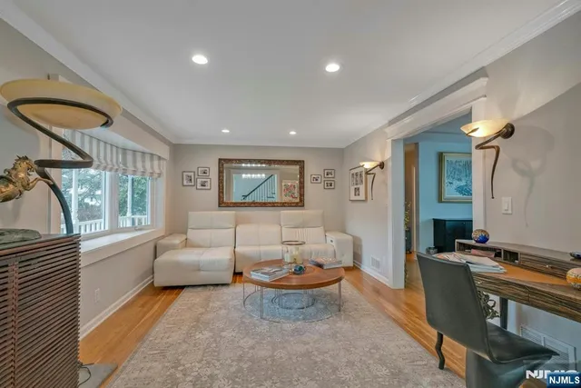 a living room with furniture and a table