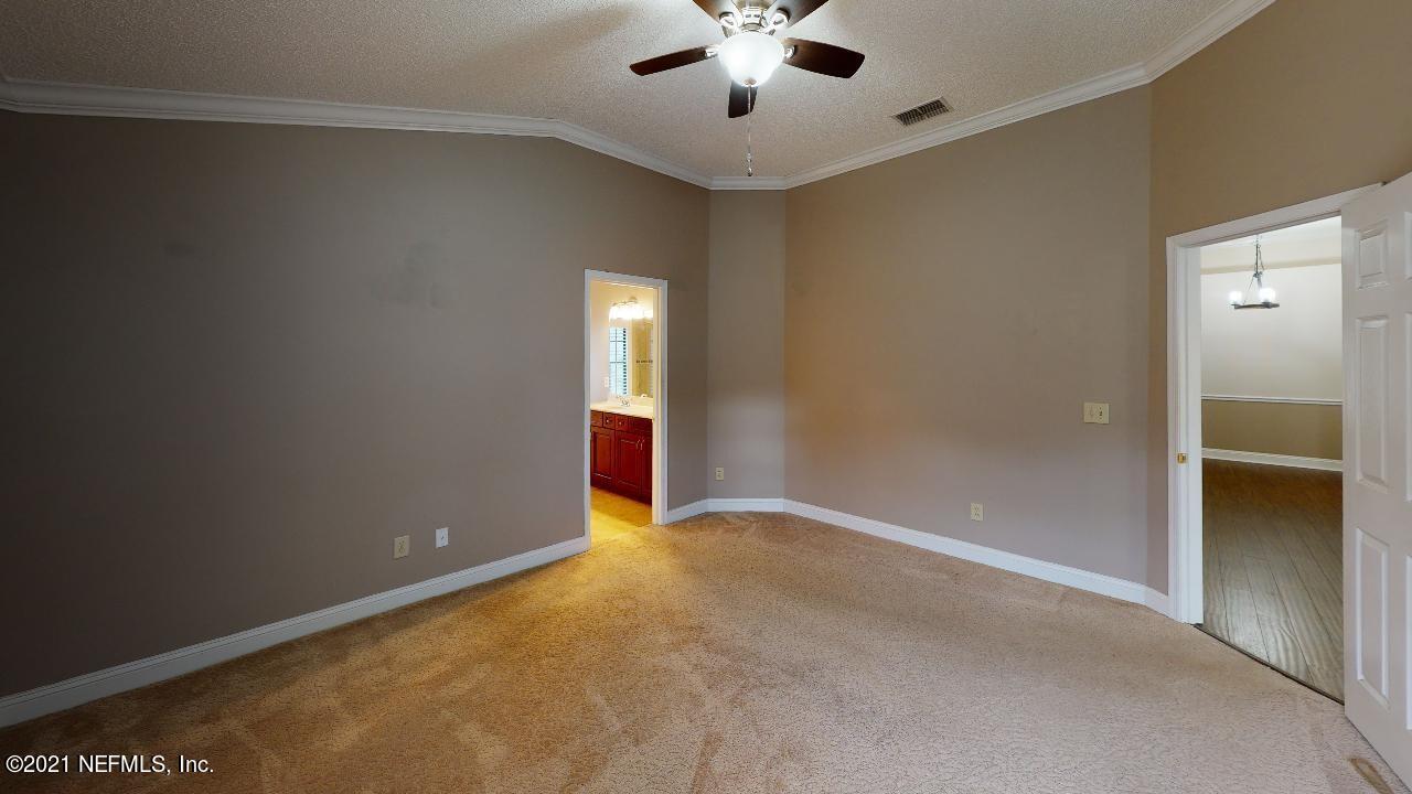 3130 Mountain Ash Road South Jacksonville, FL 32223 - Photo 22 of 60 an empty room with closet and windows