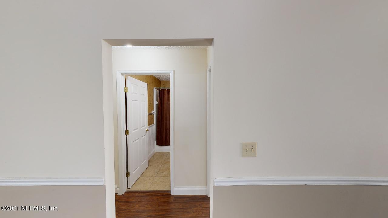 3130 Mountain Ash Road South Jacksonville, FL 32223 - Photo 31 of 60 a view of a hallway with wooden floor