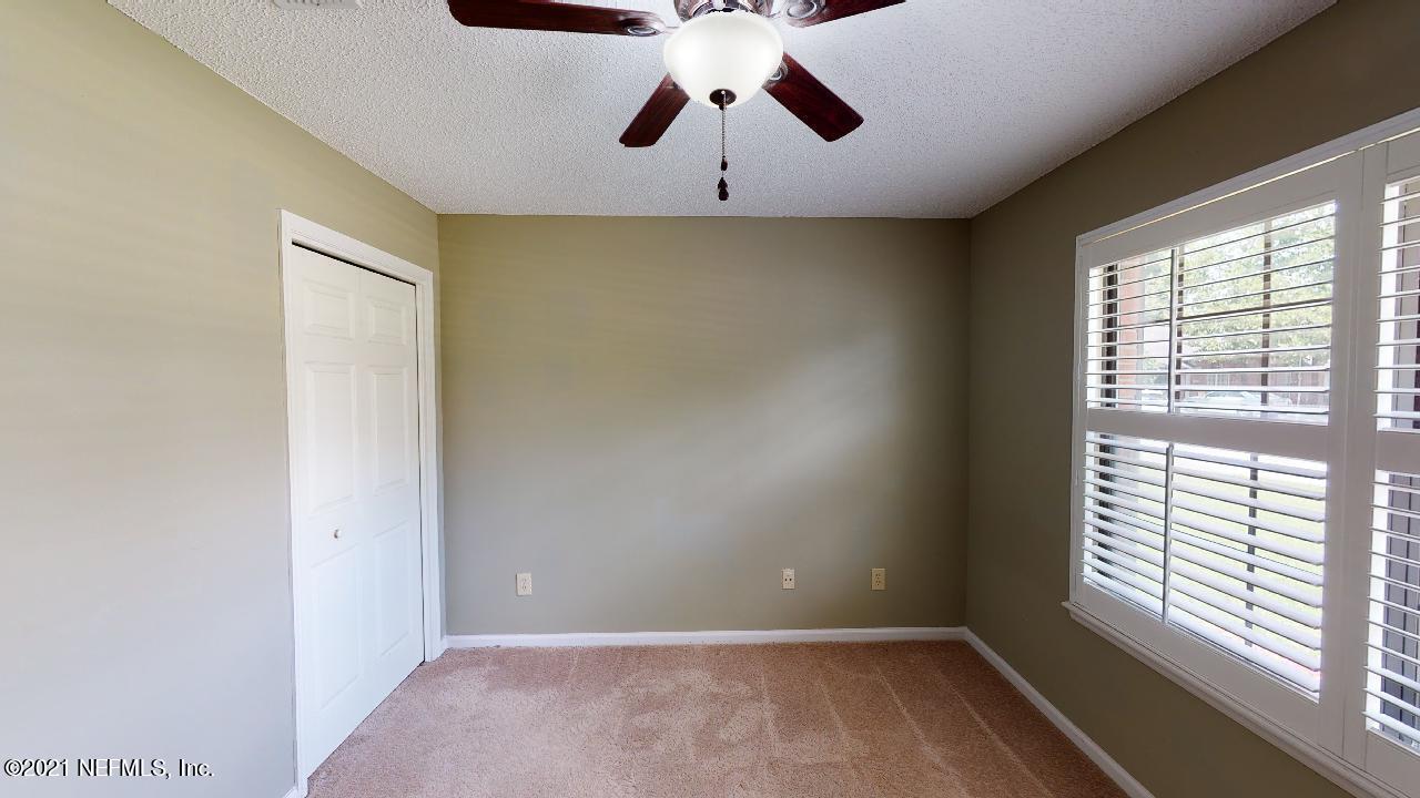 3130 Mountain Ash Road South Jacksonville, FL 32223 - Photo 47 of 60 a view of room with window and ceiling fan