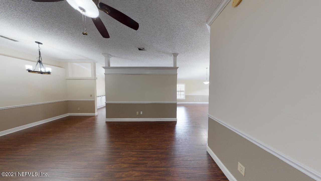 3130 Mountain Ash Road South Jacksonville, FL 32223 - Photo 9 of 60 wooden floor in an empty room