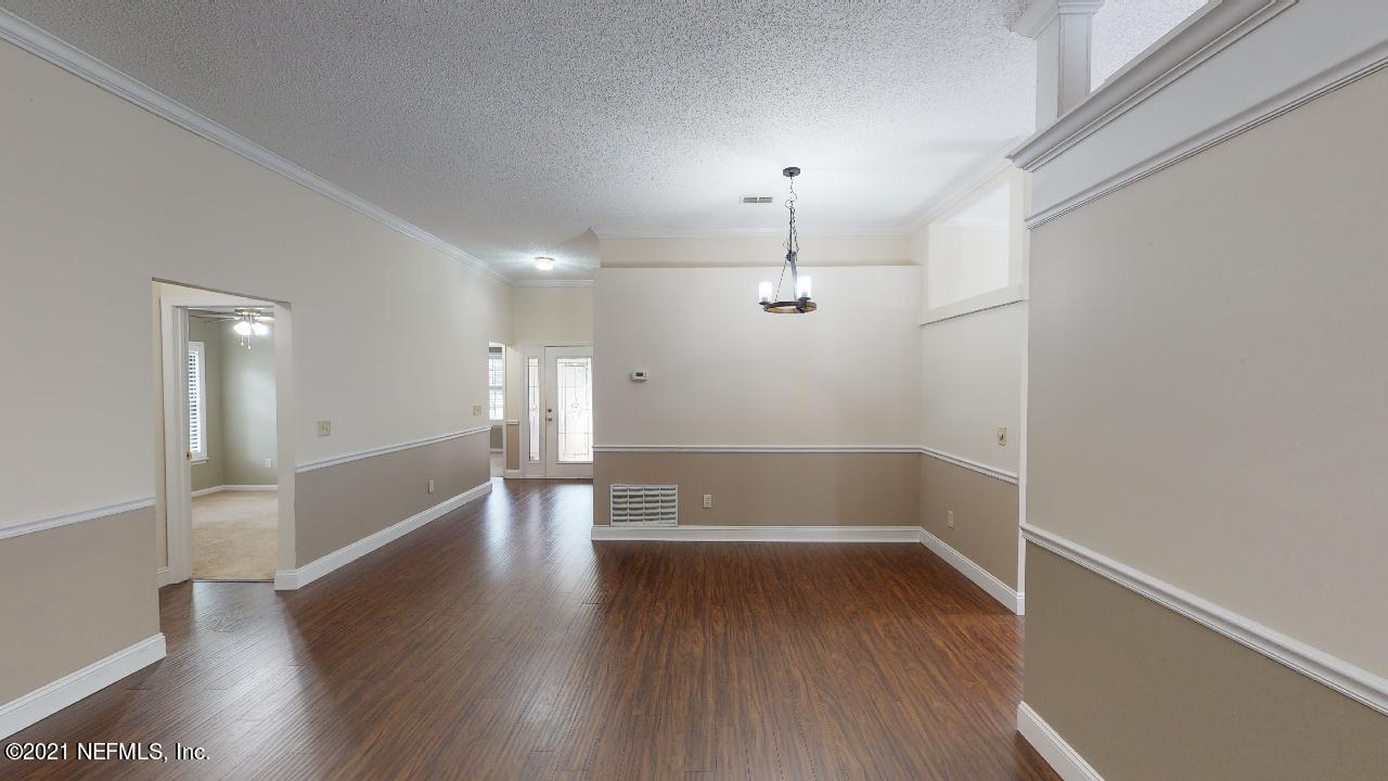 3130 Mountain Ash Road South Jacksonville, FL 32223 - Photo 10 of 60 a view of empty room with wooden floor