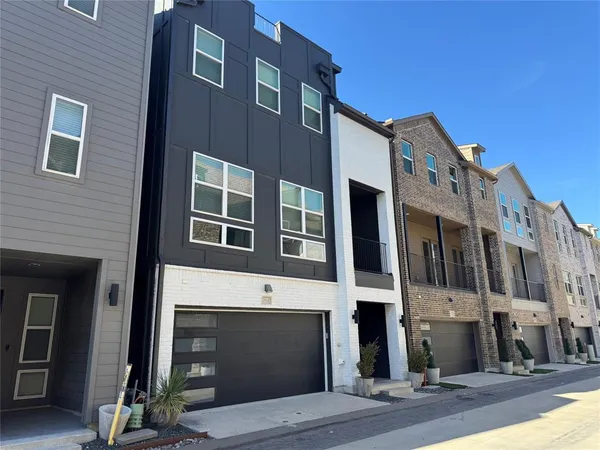 a front view of a building with a street