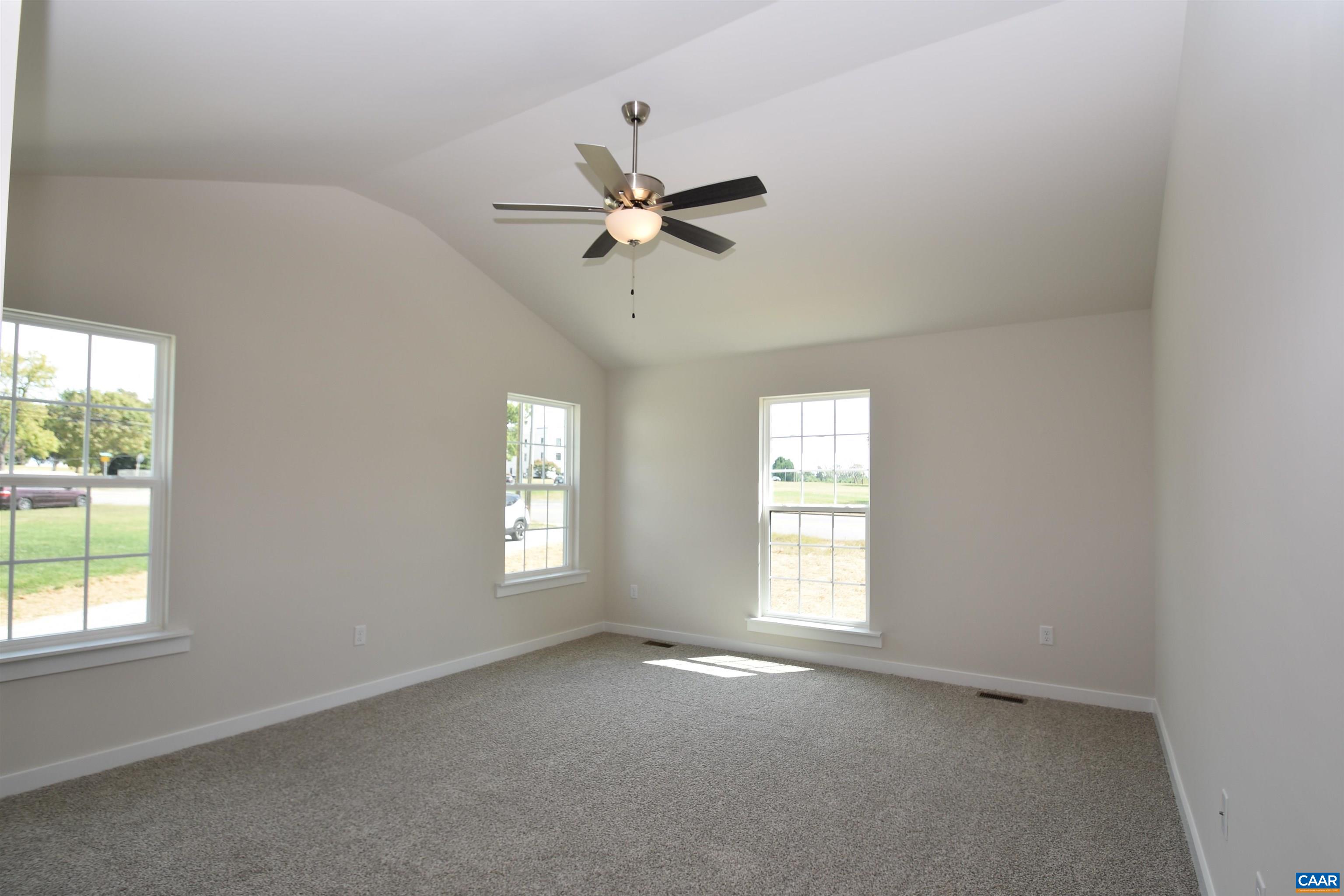 4635 James Madison Highway Fork Union, VA 23055 - Photo 12 of 22 an empty room with windows and fan