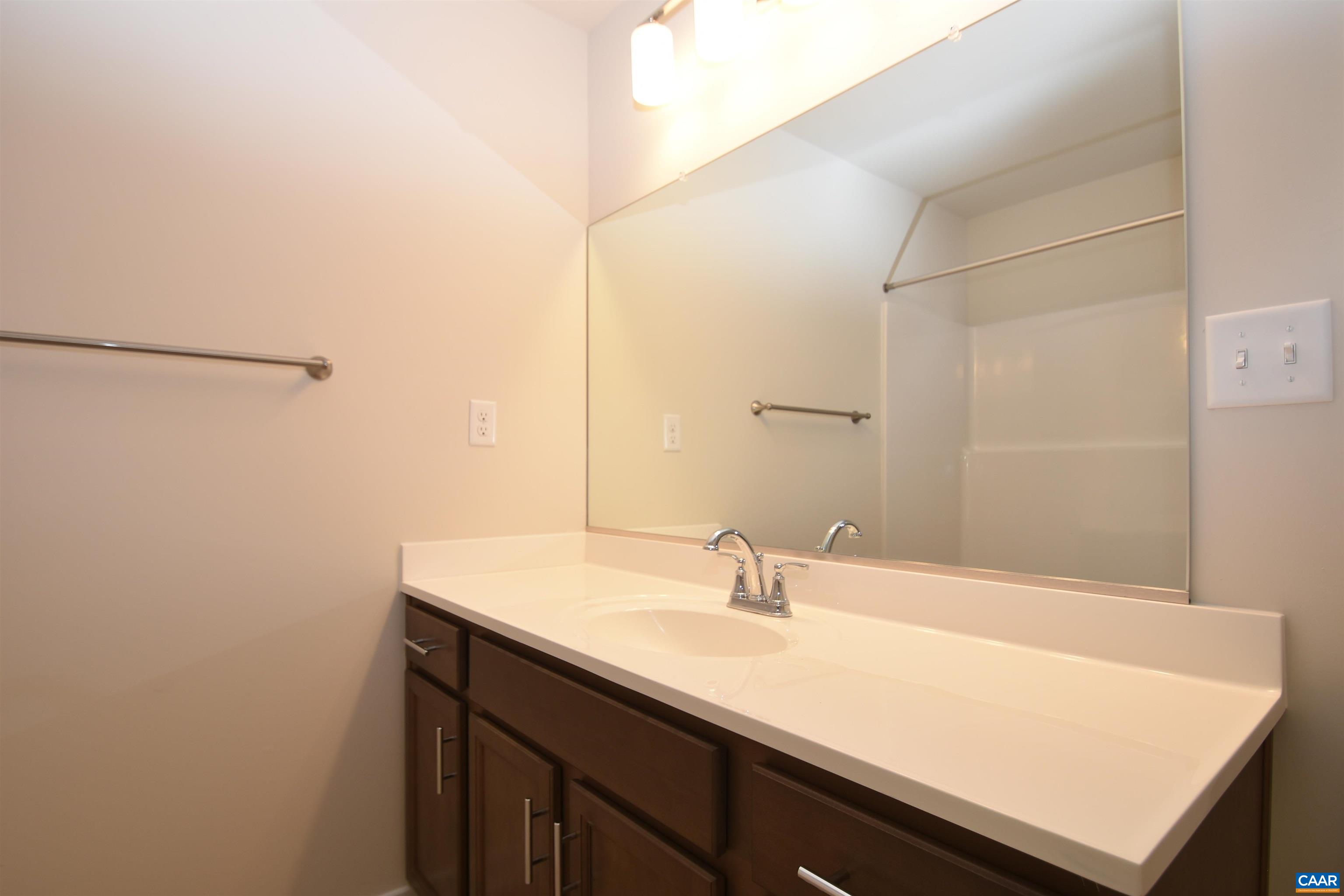 4635 James Madison Highway Fork Union, VA 23055 - Photo 17 of 22 a bathroom with a sink and a mirror