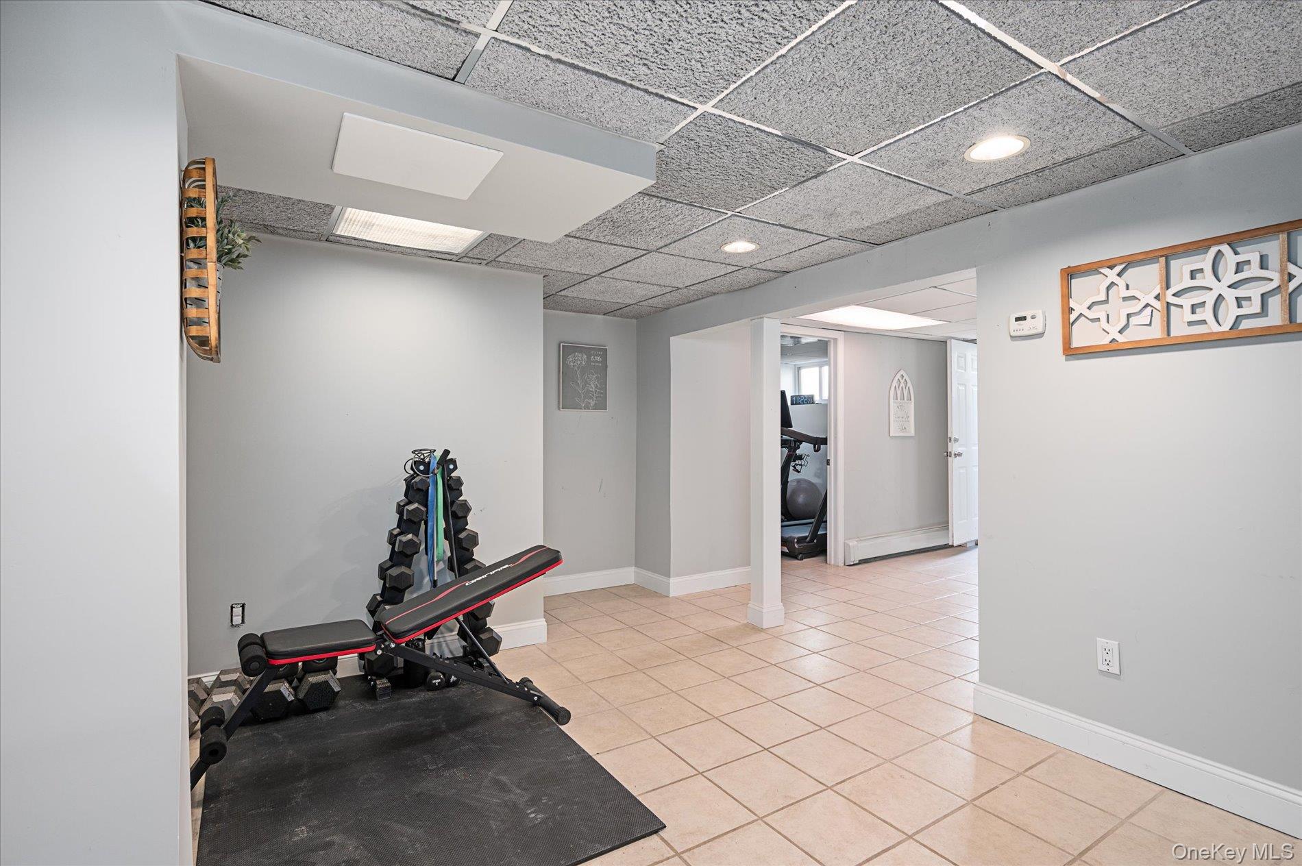 126 Walnut Road Kings Park, NY 11754 - Photo 18 of 33 a view of a room with gym equipment