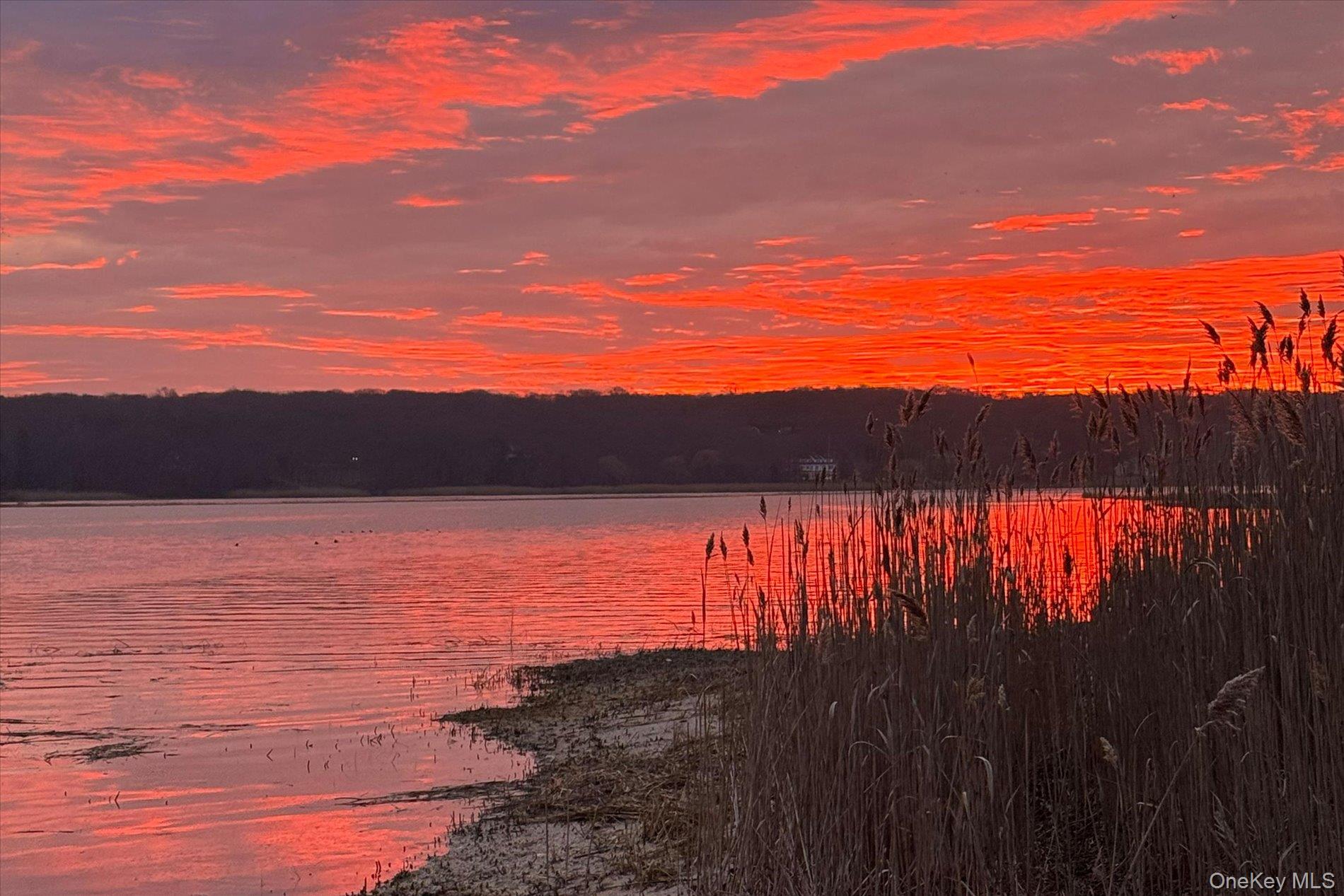126 Walnut Road Kings Park, NY 11754 - Photo 27 of 33 a view of lake and sunset