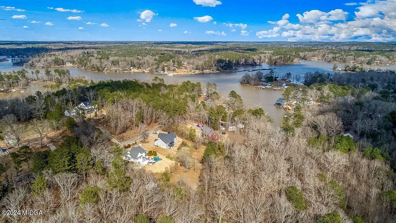 220 Thorpe Road Jackson, GA 30233 - Photo 5 of 41 a view of a lake with an outdoor space
