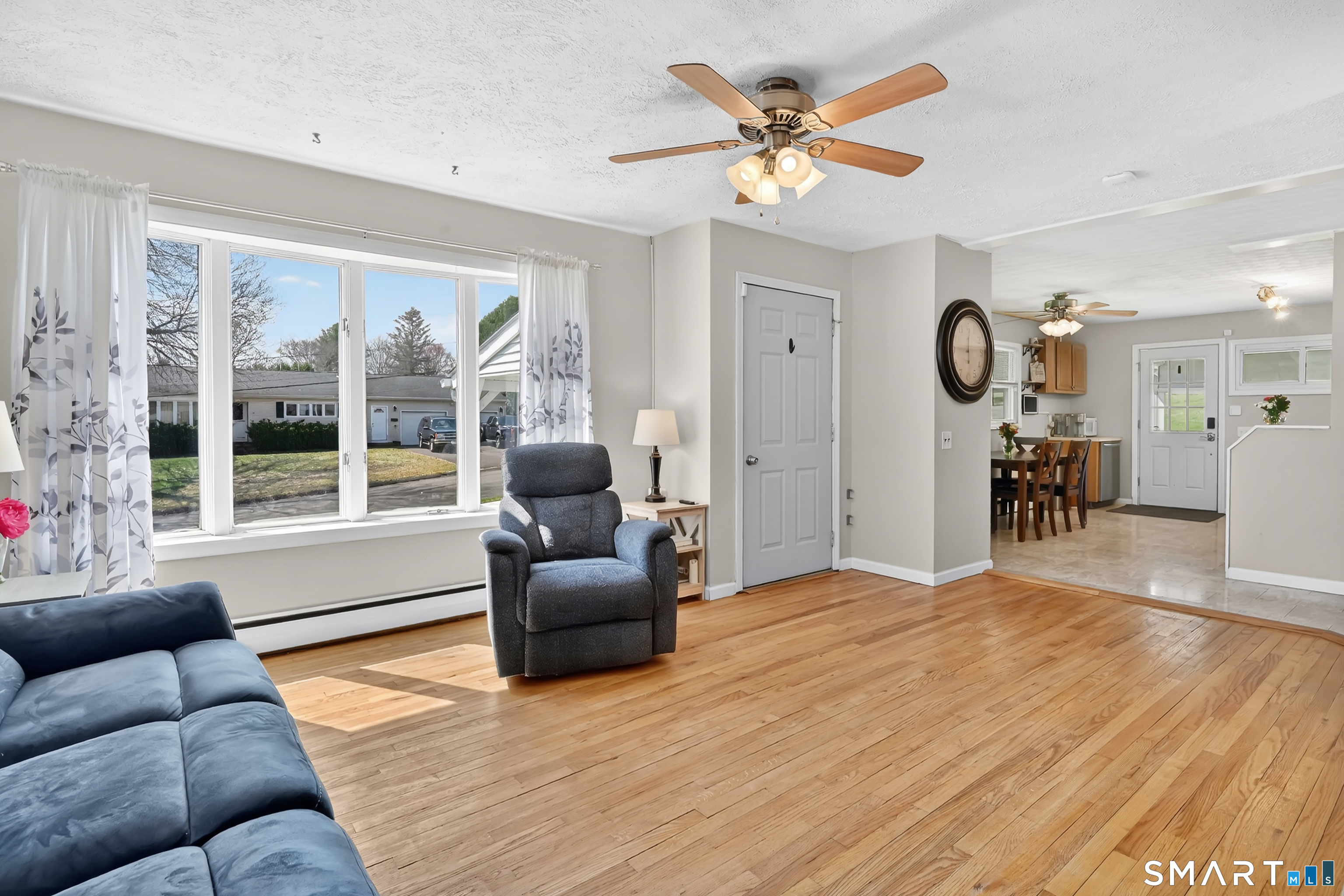 15 Meade Lane Enfield, CT 06082 - Photo 11 of 31 a living room with furniture and a large window