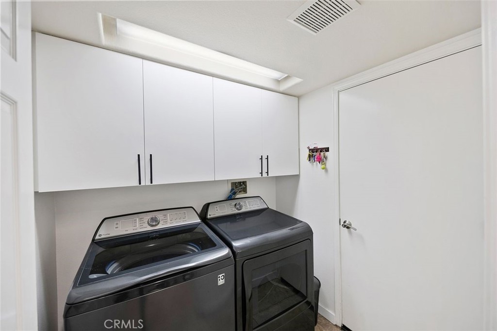 876 Cofair Court Solana Beach, CA 92075 - Photo 29 of 32 a room with storage and utility