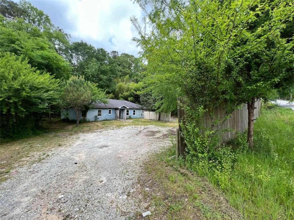 2046 Carr Road Conyers, GA 30012 - Photo 1 of 1 a view of a park that has large trees