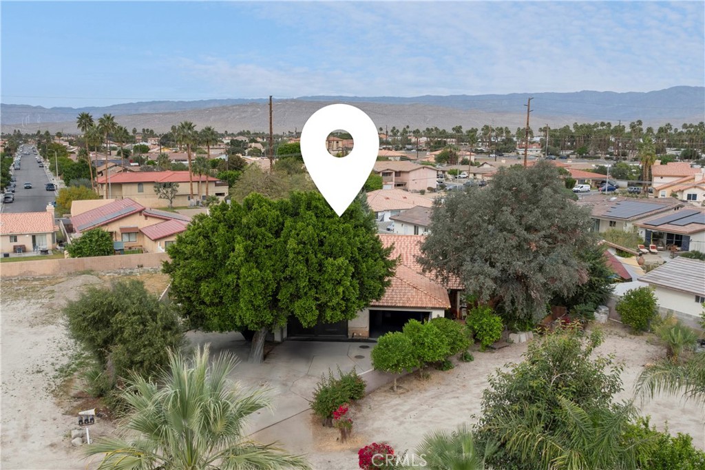 68850 Cedar Road Cathedral City, CA 92234 - Photo 14 of 16 an aerial view of a house with a yard and lake view
