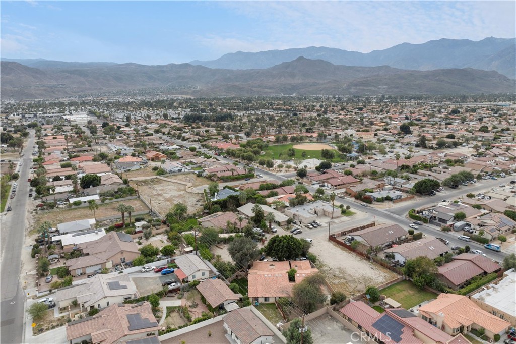 68850 Cedar Road Cathedral City, CA 92234 - Photo 15 of 16 an aerial view of residential house and parking space