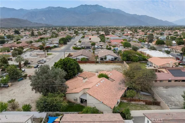 an aerial view of residential house and outdoor space