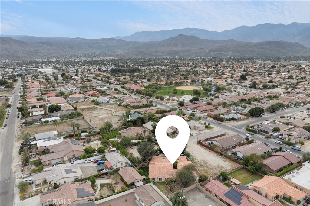 68850 Cedar Road Cathedral City, CA 92234 - Photo 8 of 16 an aerial view of a house with a garden