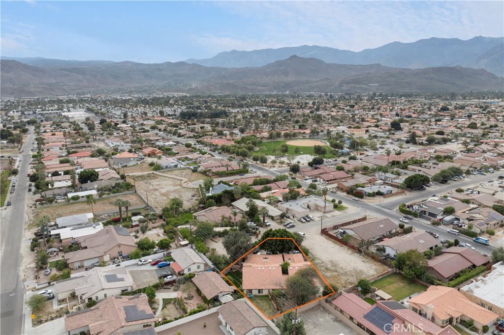 68850 Cedar Road Cathedral City, CA 92234 - Photo 9 of 16 an aerial view of residential house and parking space