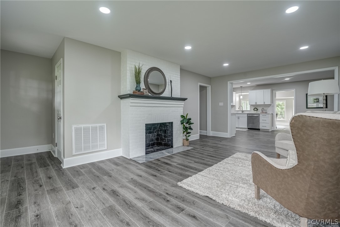 5304 River Road West Goochland, VA 23063 - Photo 11 of 47 a living room with furniture and a fireplace