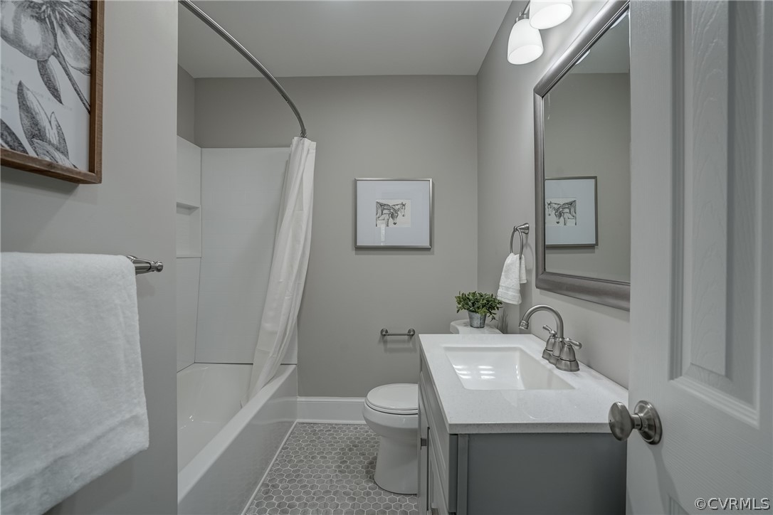 5304 River Road West Goochland, VA 23063 - Photo 17 of 47 a bathroom with a sink toilet and shower