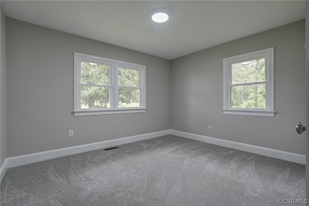 5304 River Road West Goochland, VA 23063 - Photo 18 of 47 an empty room with windows