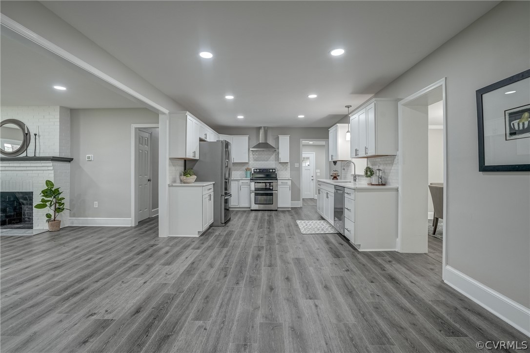 5304 River Road West Goochland, VA 23063 - Photo 23 of 47 a view of kitchen view wooden floors appliances and cabinets