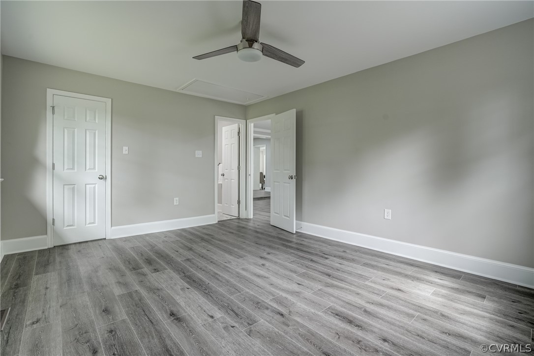 5304 River Road West Goochland, VA 23063 - Photo 34 of 47 a view of an empty room with wooden floor ceiling fan