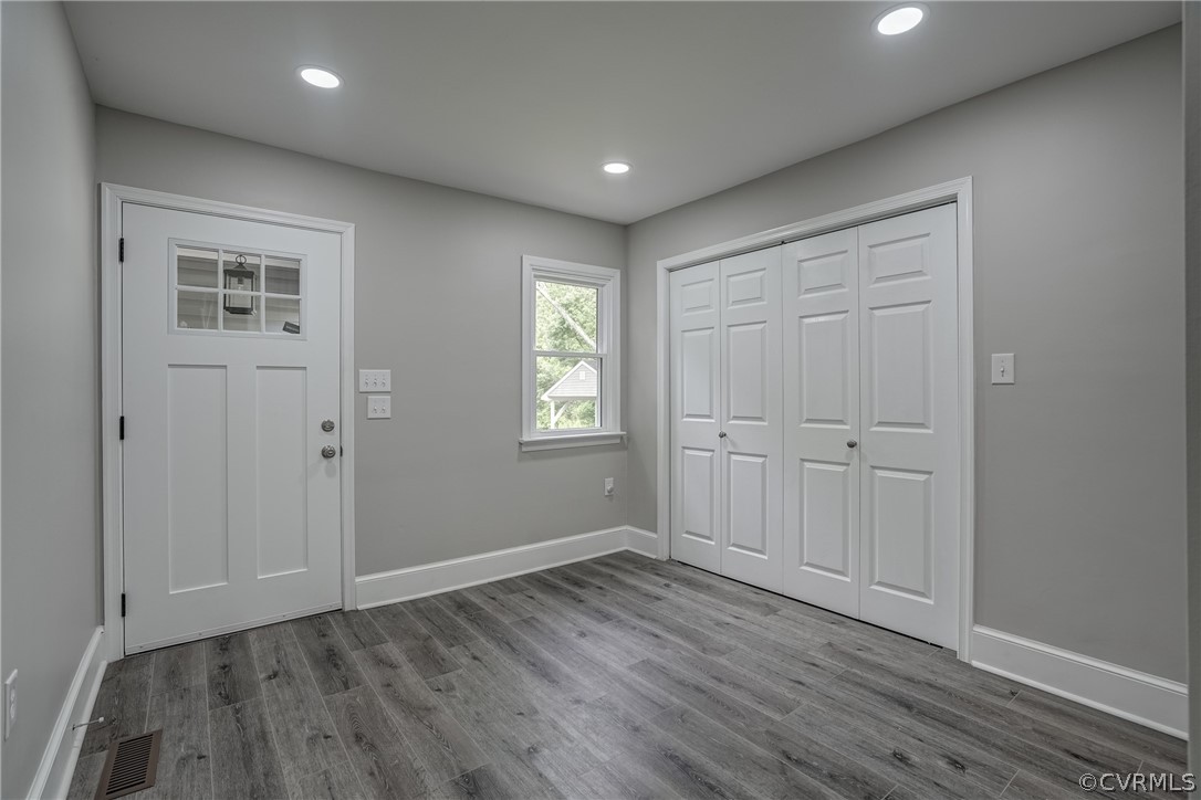 5304 River Road West Goochland, VA 23063 - Photo 41 of 47 a view of an empty room with wooden floor and a window
