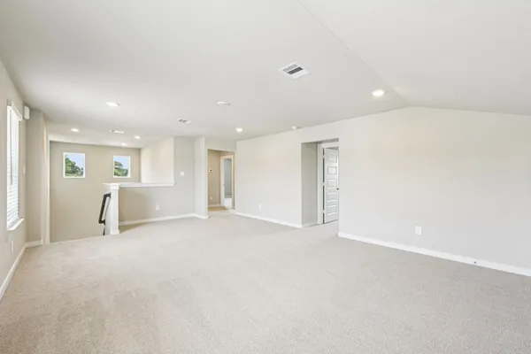 a view of a livingroom and a kitchen