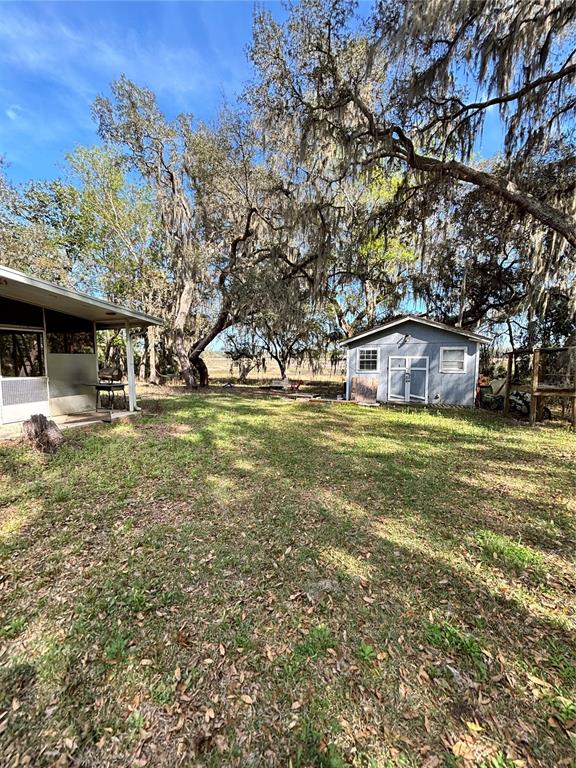 14179 Northeast 53rd Court Road Citra, FL 32113 - Photo 4 of 8 a view of a house with a yard